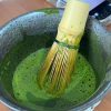 The tea whisk is stirring the top-notch matcha of spring 2025 The tea whisk stirs the top-notch matcha of spring 2025- presenting a natural green color