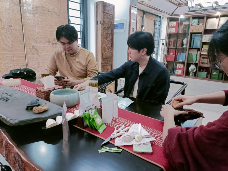 Grace is making matcha for the guests