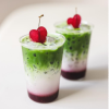Cherry Matcha Latte with Cherry Garnish