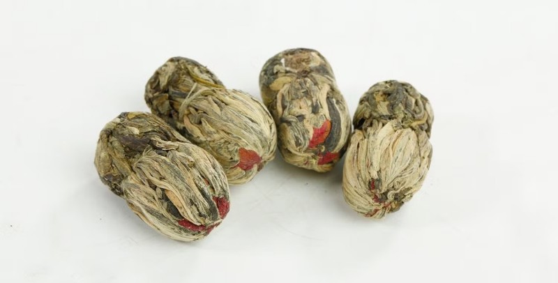 Handcrafted blooming tea balls ready for brewing